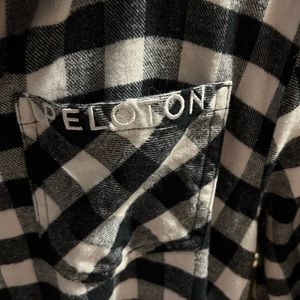 NEW peloton women’s flannel. Women’s button down flannel. Size MED. NEVER worn.